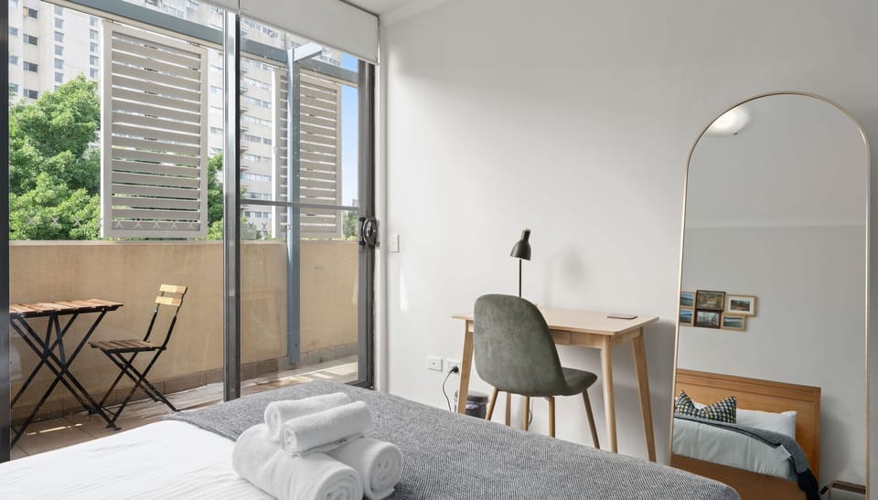 Wake up to fresh air with direct access to your private balcony from the bedroom.