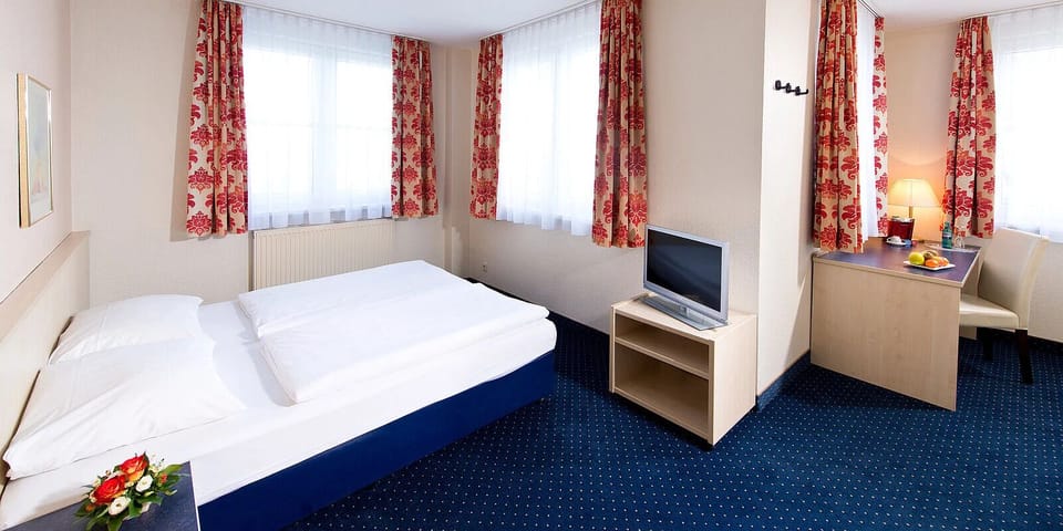 edroom. Interior and views may vary based on location and availability.