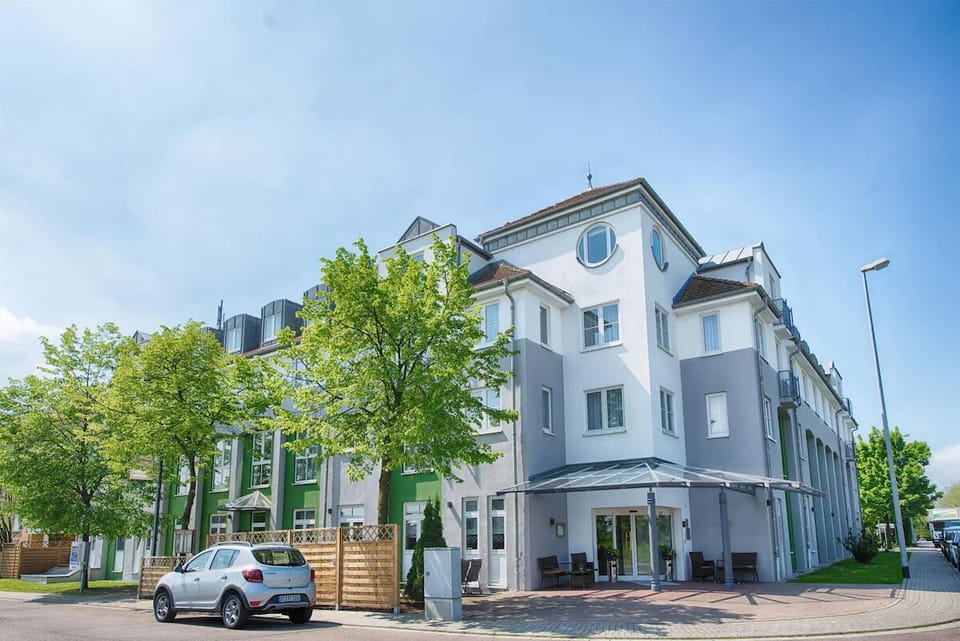 Arrive with ease to a bright, modern hotel exterior.