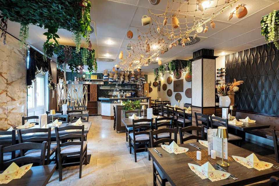 Toast the evening in an inviting restaurant with unique ceiling details.