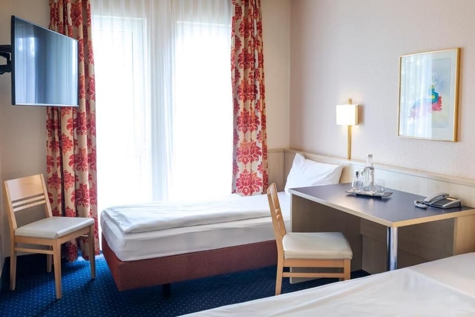 edroom. Interior and views may vary based on location and availability.