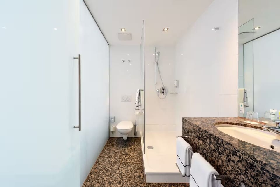 Start your day with bright vanity space and plush towels.