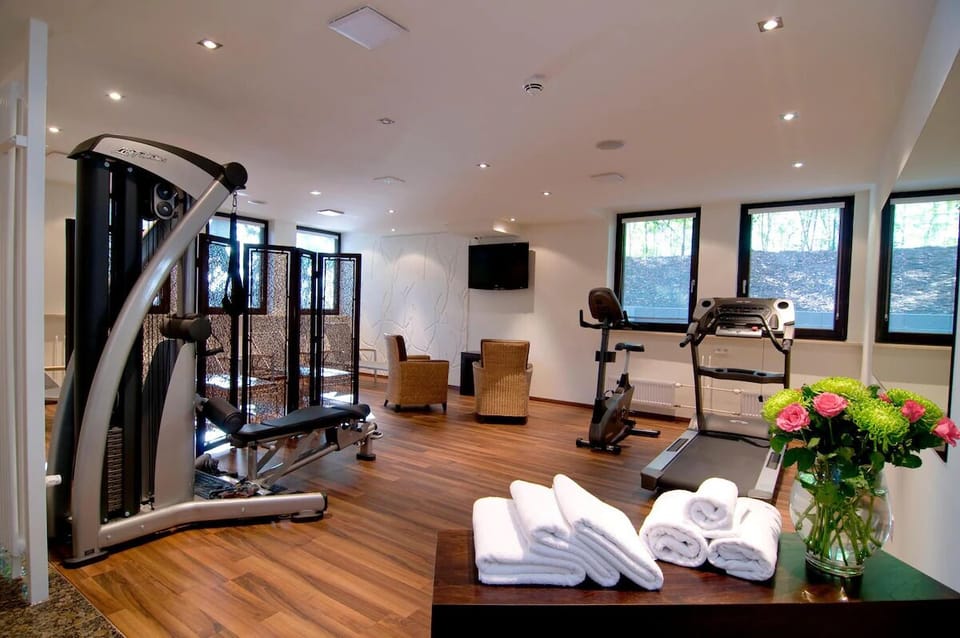 Refresh after training with plush towels and airy, calm space.