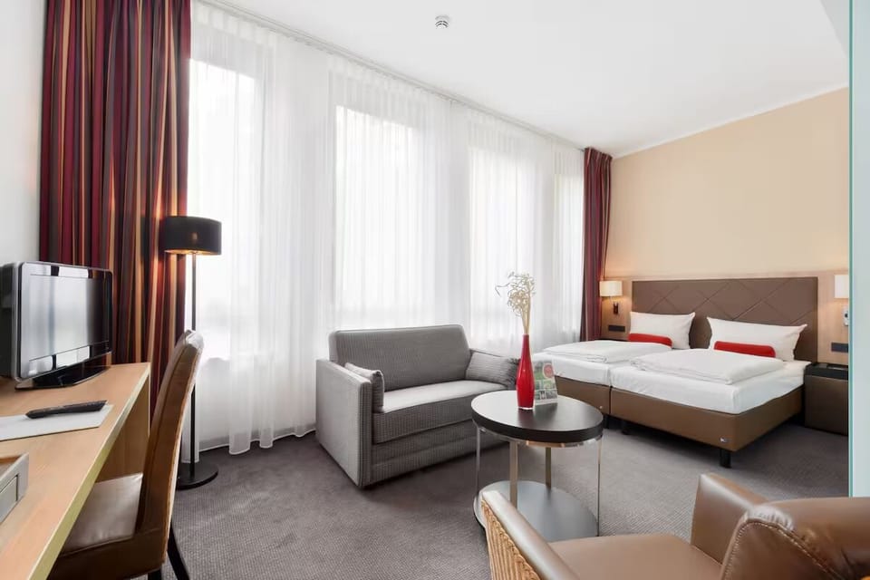 Wake up to soft daylight and a calm, spacious room.