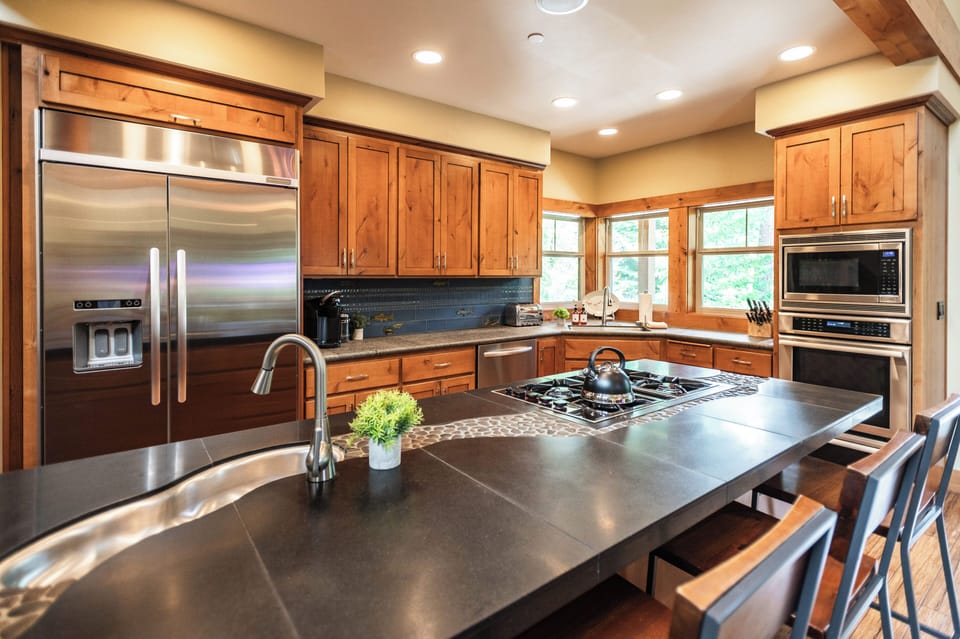 Prepare memorable meals in the fully equipped chef's kitchen with premium appliances and generous workspace.