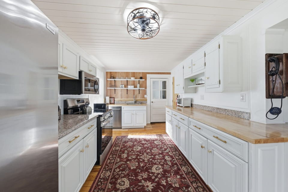 Another view of the spacious kitchen.
