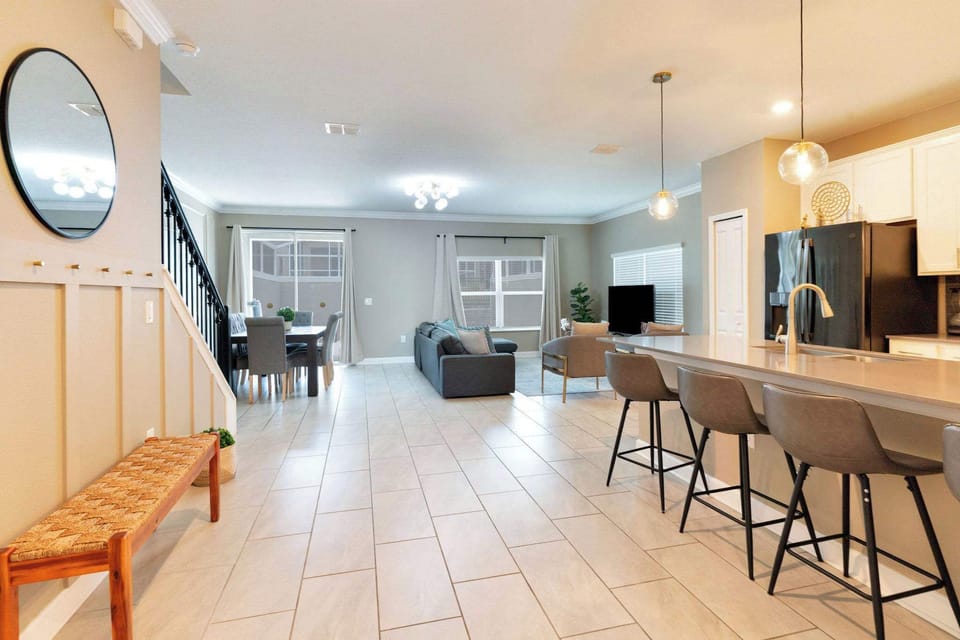 The open layout keeps everyone connected, from breakfast at the island to relaxing together in the living room.