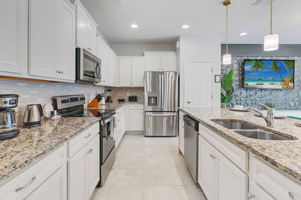 A fully equipped chef's kitchen ready for everything from quick park snacks to special family dinners.