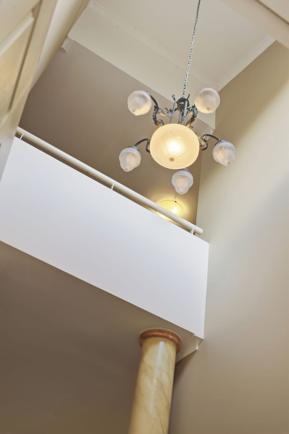The high ceilings and elegant lighting fixtures create a bright and welcoming atmosphere from the moment you step inside.