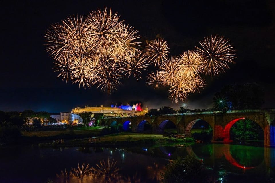 Front-row views of Carcassonne's famous 14 July fireworks — one of France's most spectacular Bastille Day displays, watched from the hotel grounds.