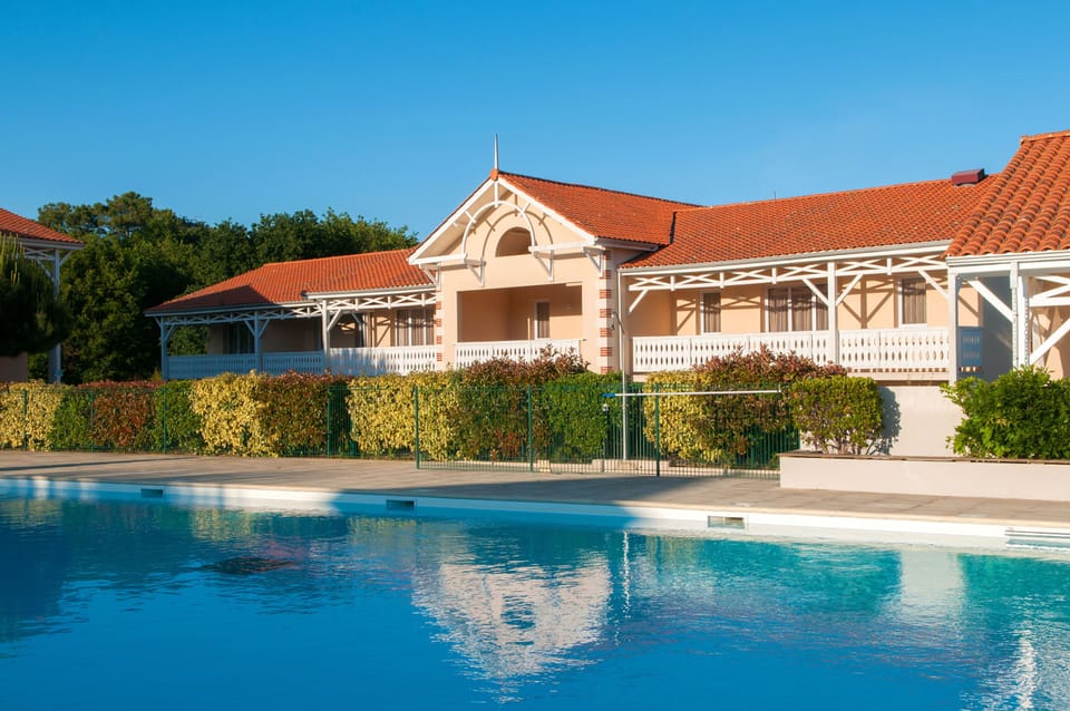 The heated outdoor pool set among lush park grounds, open from April to mid-September.