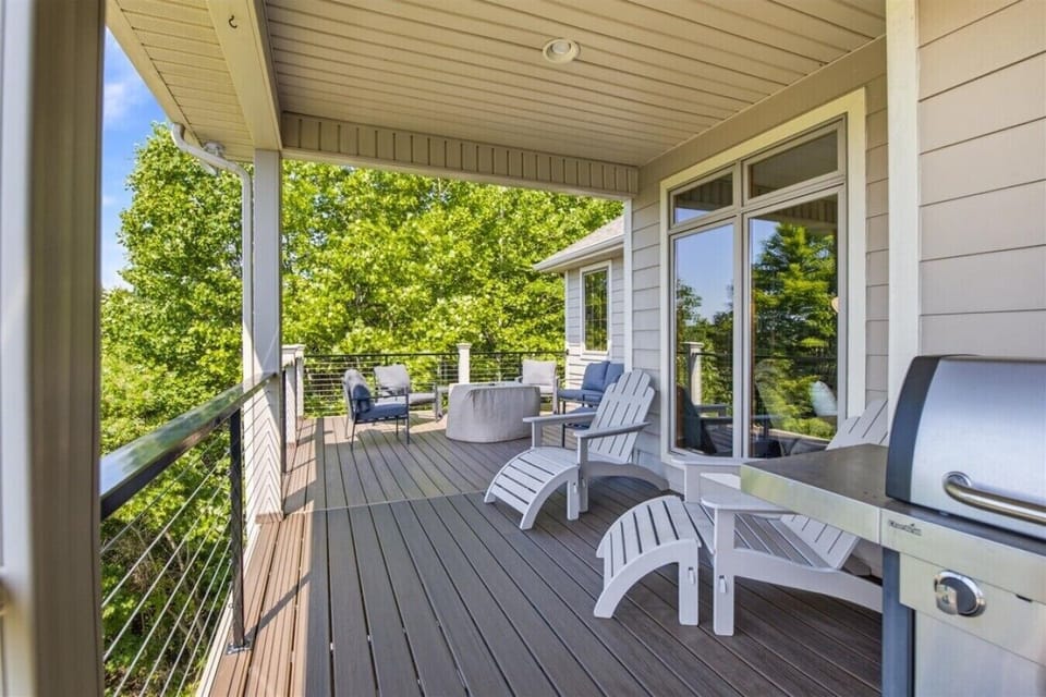 Enjoy the views from the upper level covered deck or cozy around the firepit after a long day