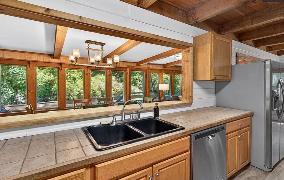 Kitchen with Frig, Stove, Microwave and Dishwasher