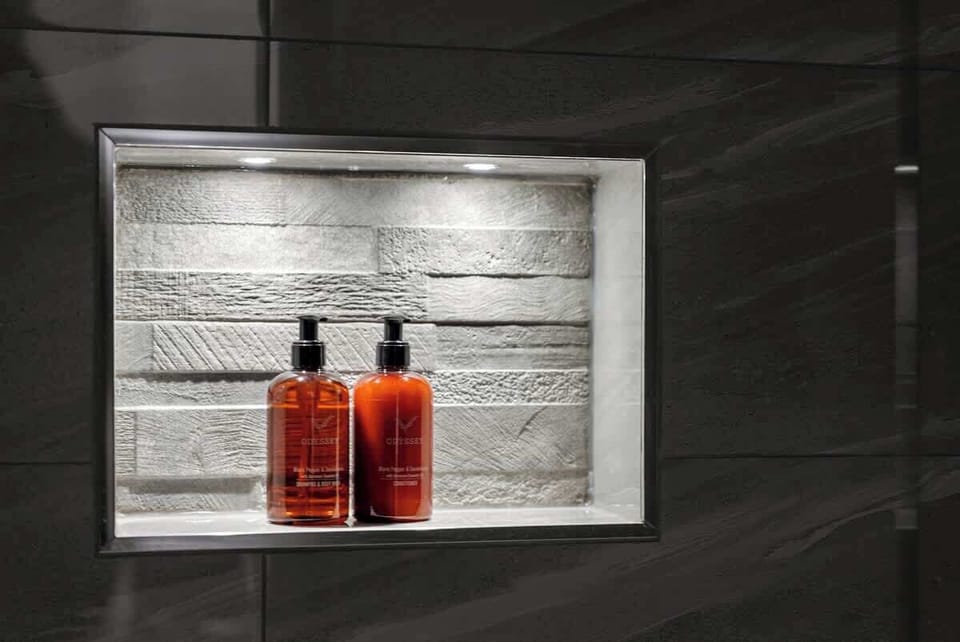 Enjoy a refreshing walk-in shower in the beautifully finished bathroom at Blue Puffin Stays Short Lets & Serviced Accommodation, offering modern fittings and a clean, calming space to start or end your day.