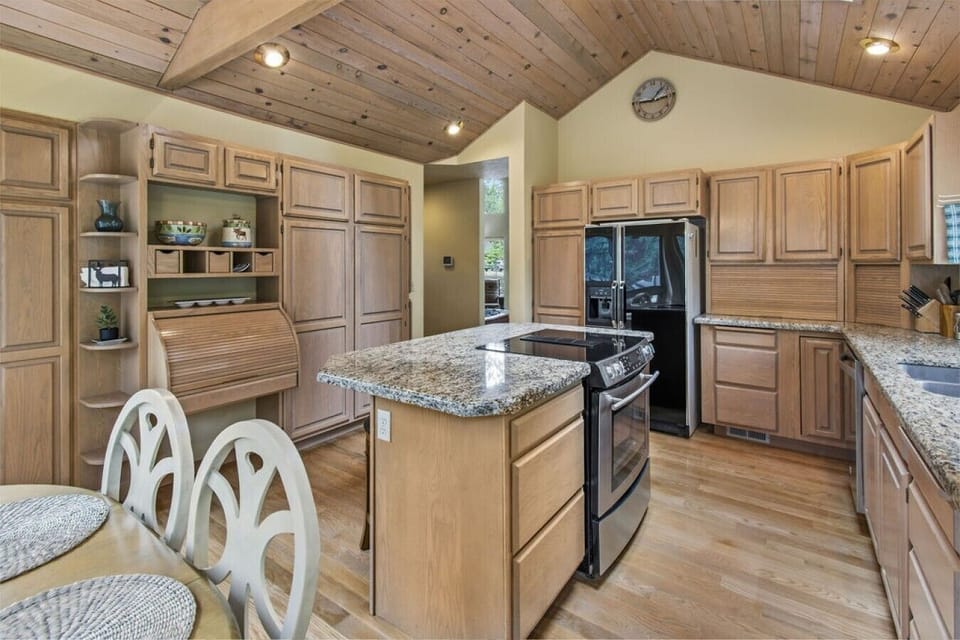 Large island offers extra prep space and casual seating.