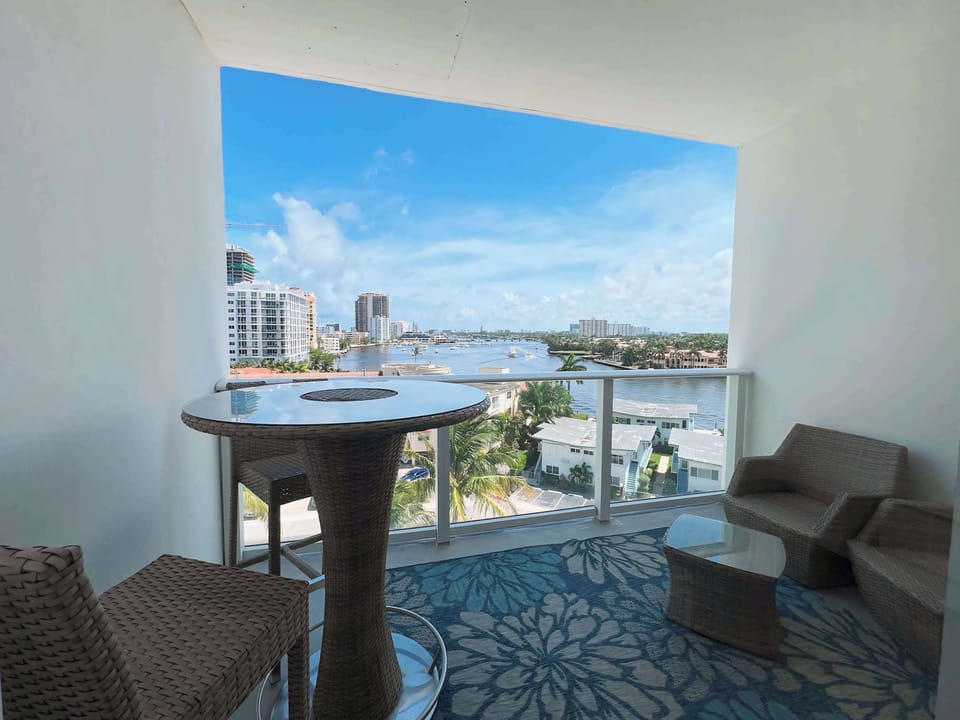 Covered outdoor seating with scenic water views
