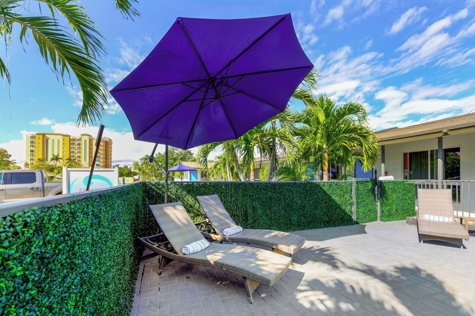 Relax poolside under the sun or in the shade