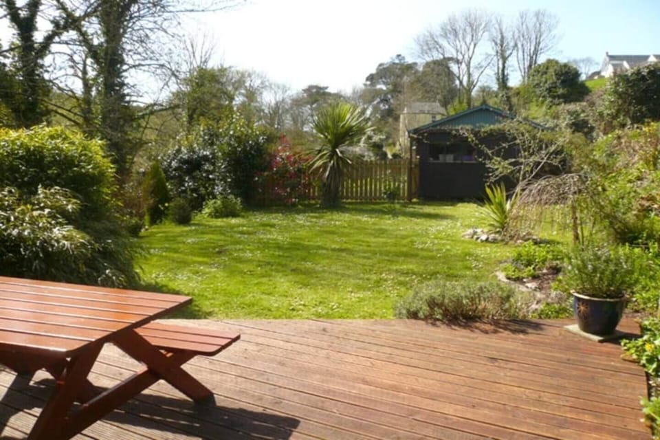 Garden with decked area and picnic table