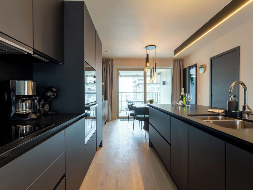 Kitchen, Countertop, Interior Design, Flooring, Ceiling, Furniture, Cabinetry, Light Fixture, Floor, Lighting