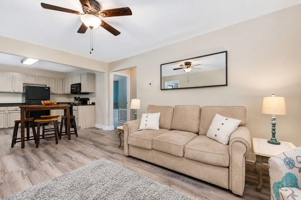 The open layout keeps everyone connected, whether you`re relaxing on the sofa, cooking dinner, or sharing stories from the day`s adventures.