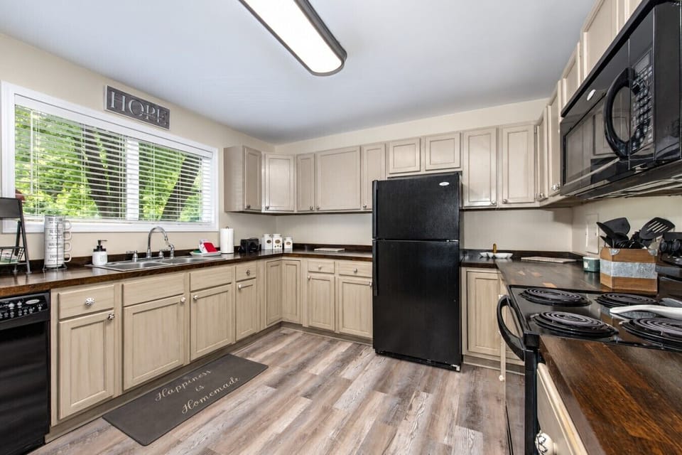 The fully equipped kitchen has everything you need to prepare breakfast before heading to Dollywood or a family dinner after a day of exploring the Smokies.