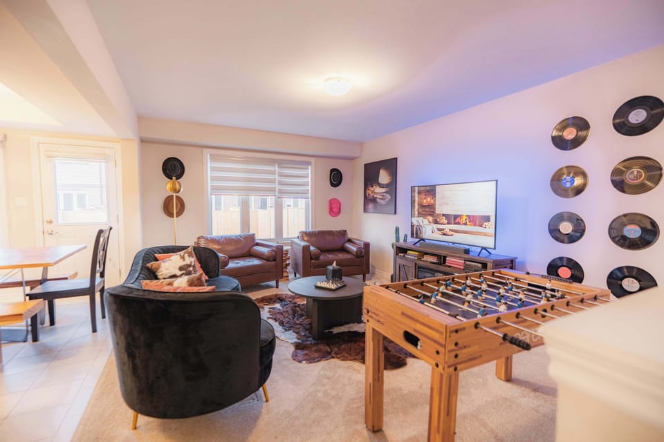 Spacious and inviting living area with comfortable seating, perfect for movie nights, conversations, or unwinding after a day of exploring.