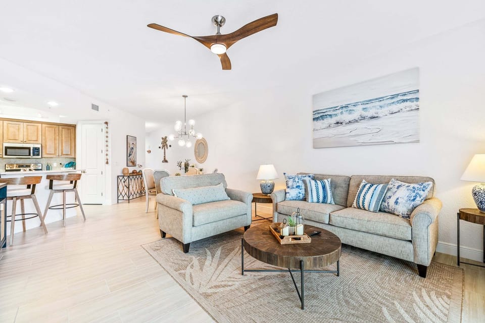 A spacious gathering area with stylish coastal décor.