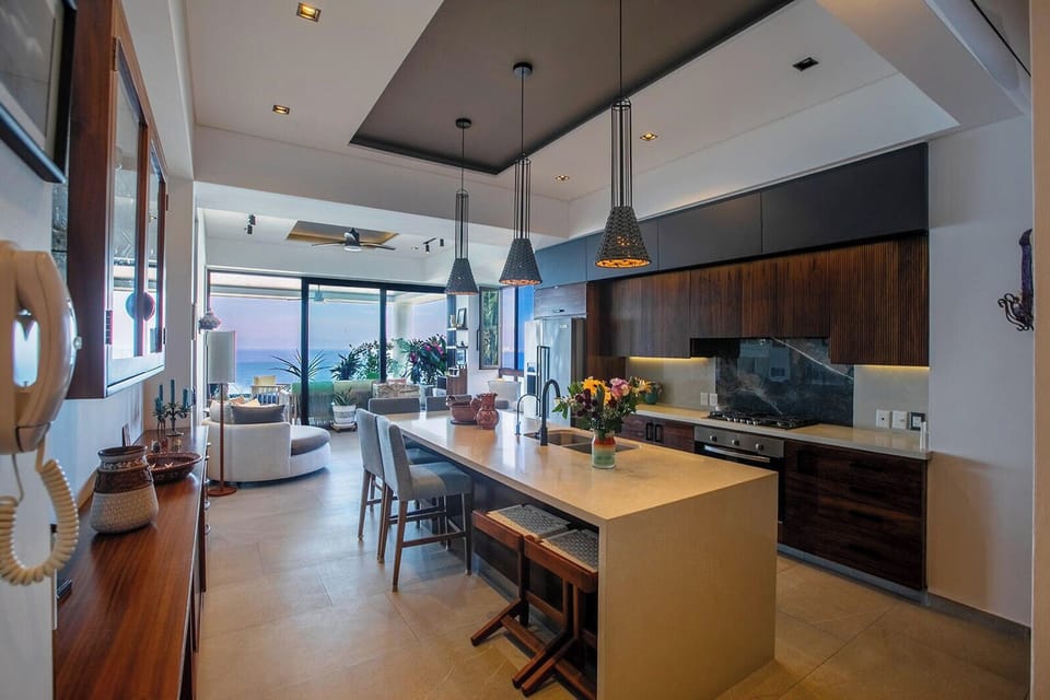 Your modern kitchen flows seamlessly into a stunning open living space