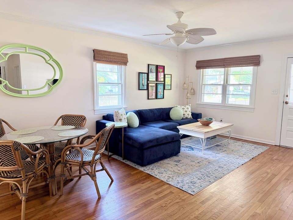 Dining table (two extra chairs are located in the teal room) and family room
