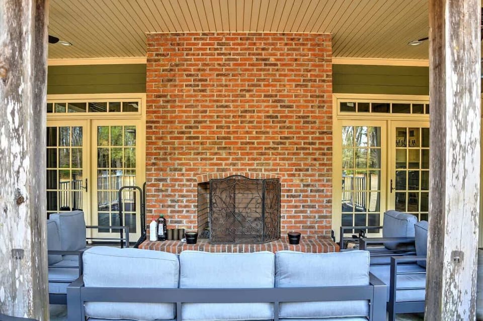 Cozy outdoor brick fireplace — ideal for evening conversations and relaxing under the stars.