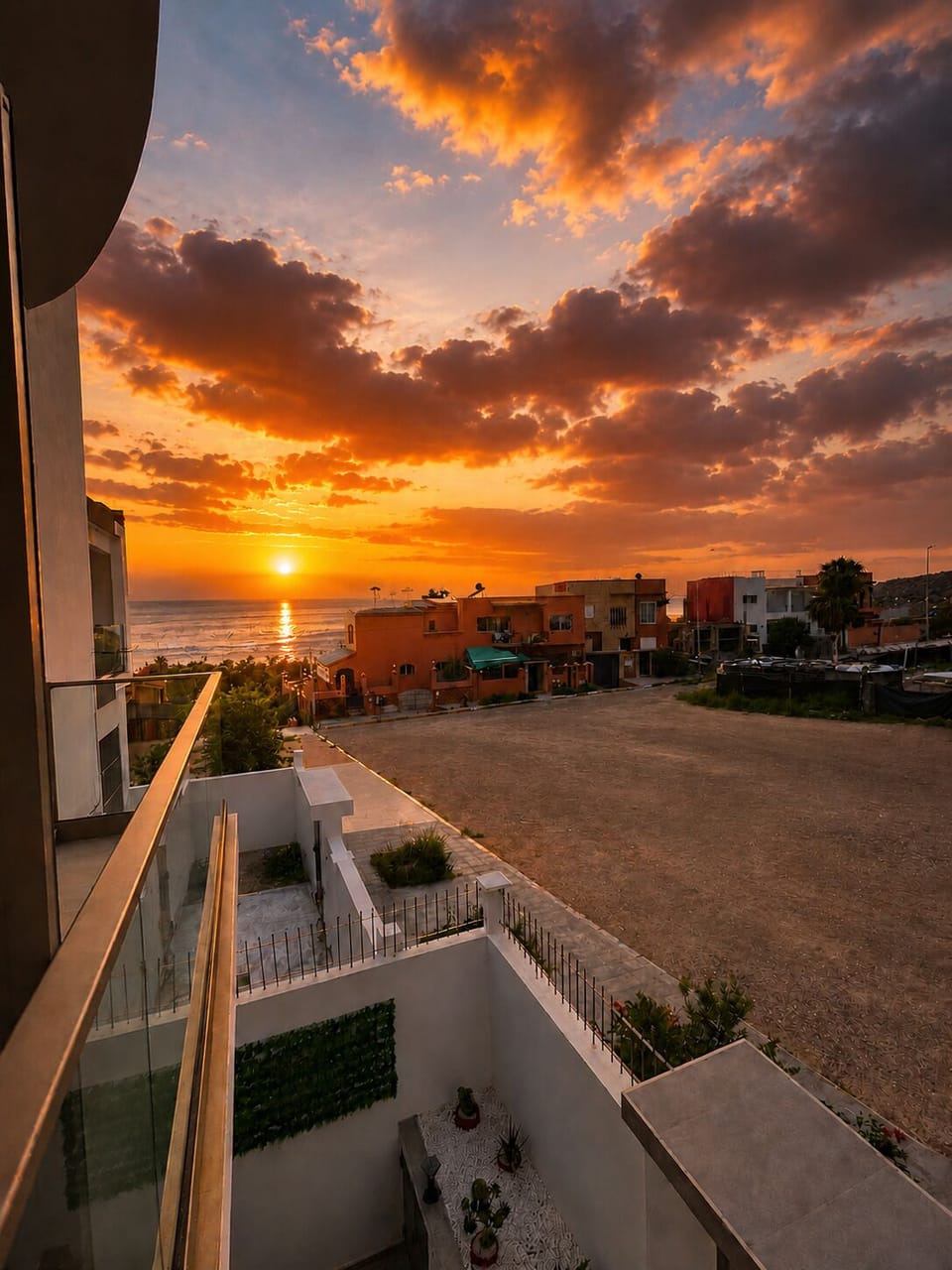 Private Ocean-view balcony 2 with breathtaking sunset over the coastal neighborhood