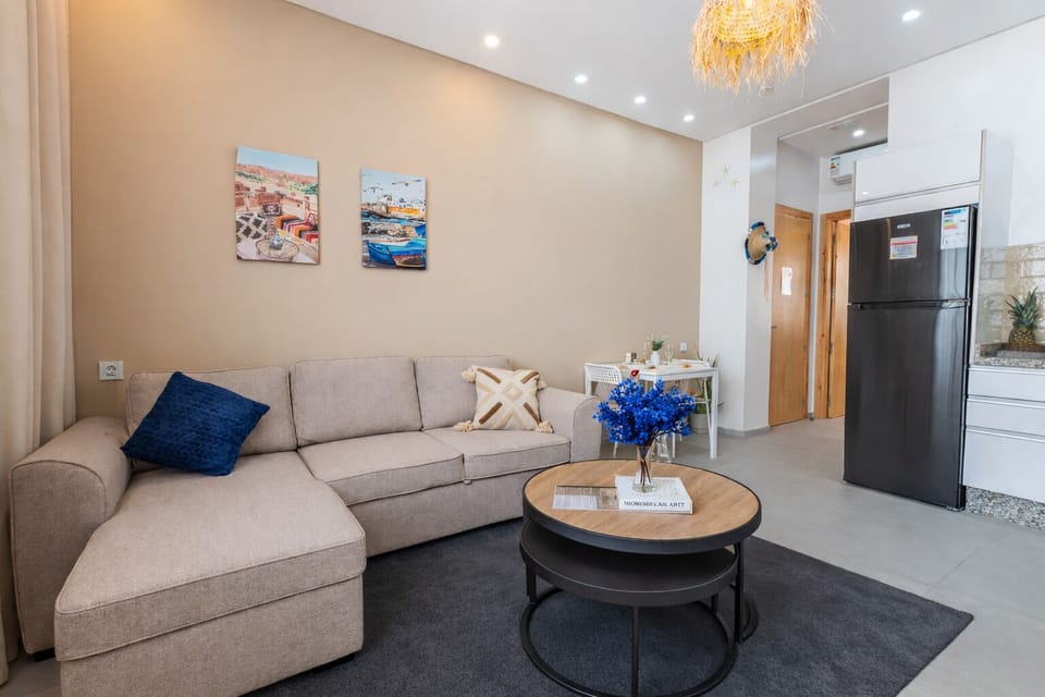 Cozy modern lounge with open kitchen and stylish, inviting decor