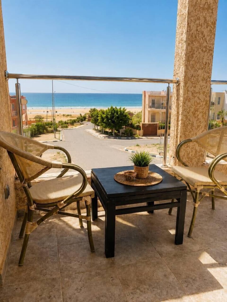 Start your mornings with coffee and Atlantic views from the terrace, just steps away from the beach and the sound of the waves.