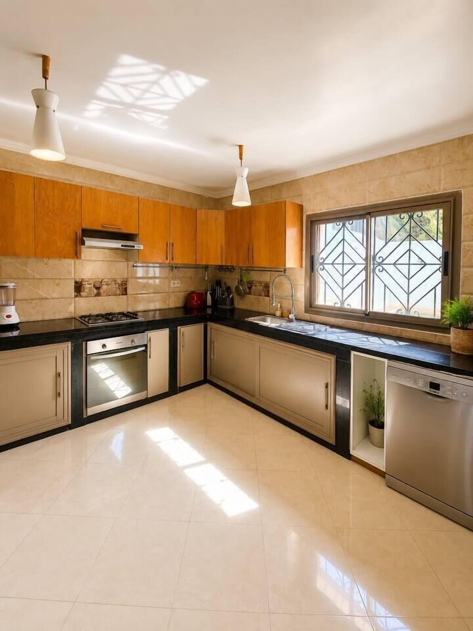 Cook with ease in the spacious fully equipped kitchen, whether it's a quick breakfast before the beach or a family feast after sunset.