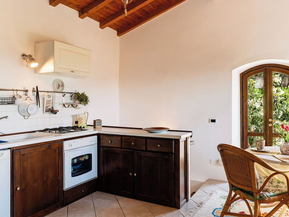 Wood, Furniture, Interior Design, Kitchen, Countertop, Flooring, Kitchen Appliance, Floor, Cabinetry, Ceiling
