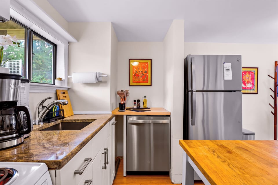 prepare your favorite meals in a warm, welcoming kitchen filled with natural light.