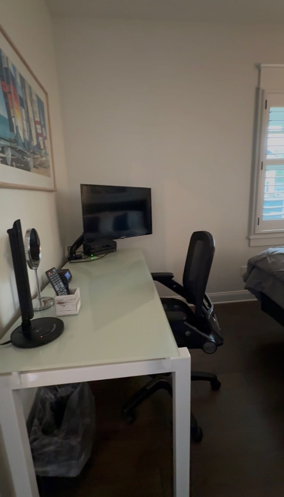 Desk with computer screen and printer