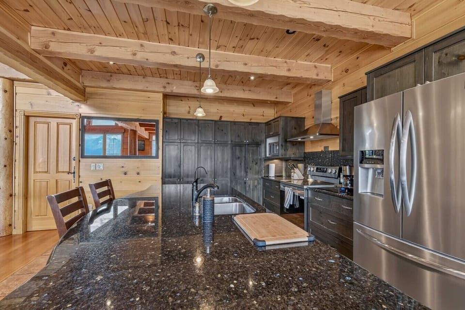 The open kitchen keeps everyone connected while meals are being prepared.