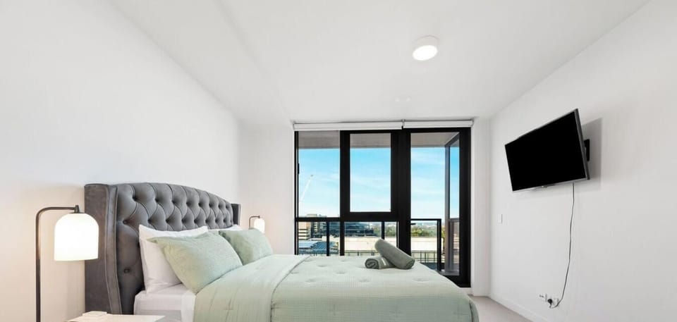 Retreat to the spacious master bedroom, thoughtfully appointed with premium bedding, generous storage, and a calming atmosphere for a restful night`s sleep.