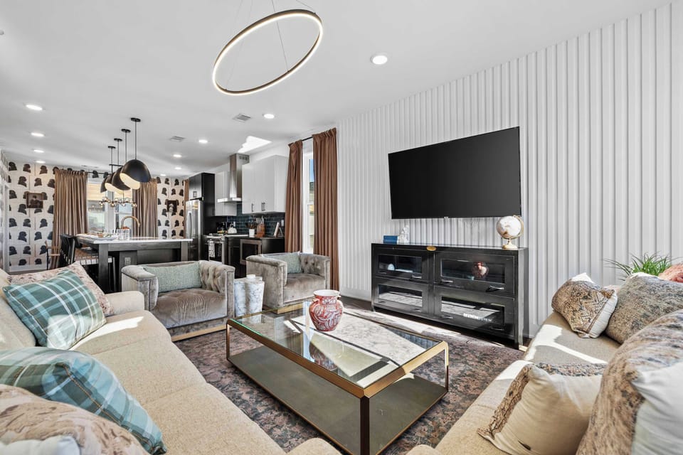 Spacious Living Area with Smart TV, Sleeper Sofa + Desk Nook