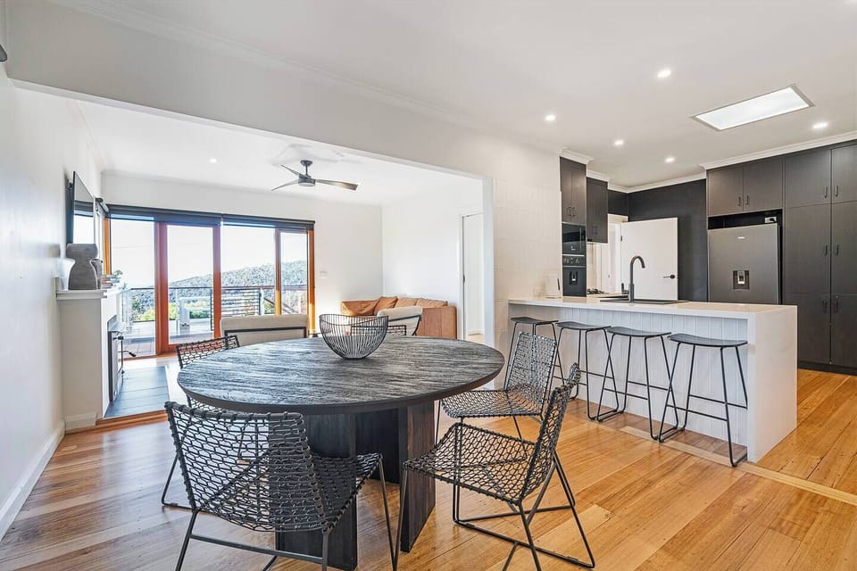Enjoy everything from leisurely breakfasts to family dinners in the dining area, thoughtfully positioned within the home's light-filled open-plan living space.