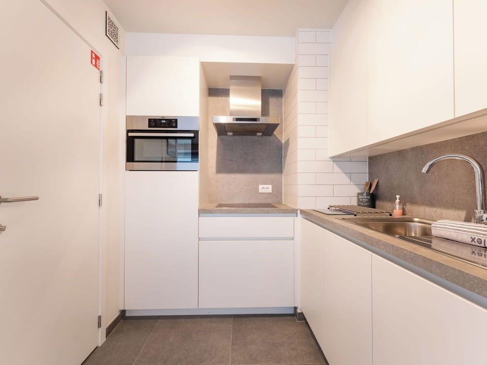Kitchen, Countertop, Interior Design, Flooring, Kitchen Appliance, Wood, Major Appliance, Floor, Cabinetry, Ceiling
