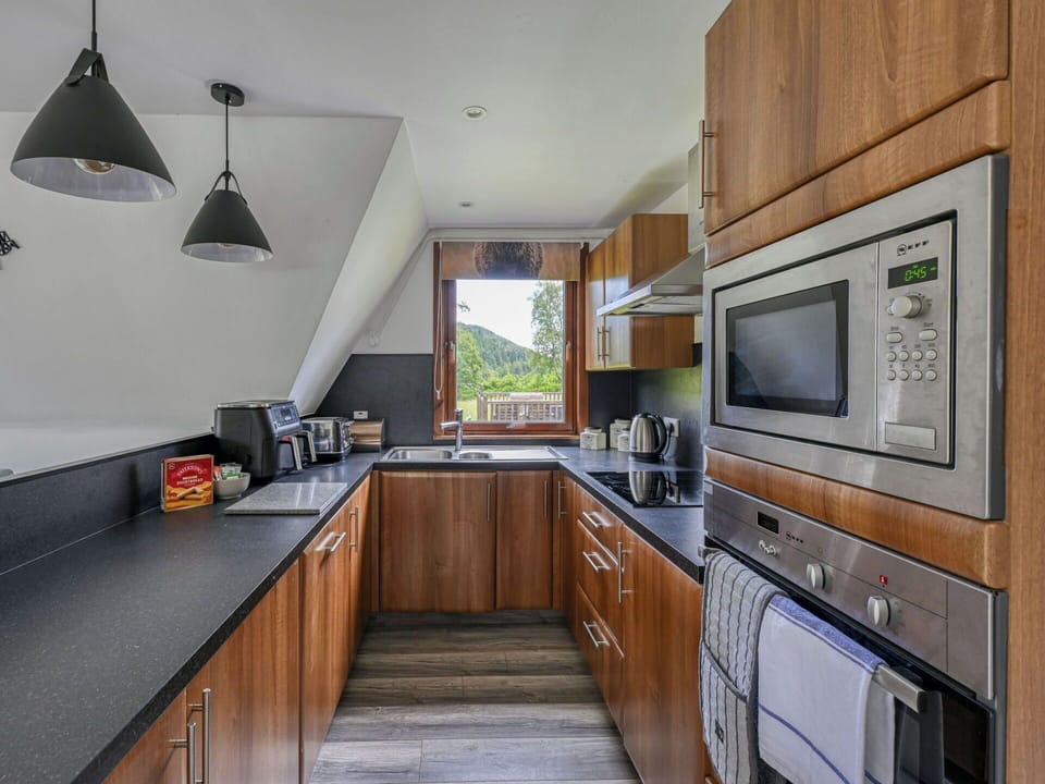 Kitchen, Interior Design, Wood, Flooring, Furniture, Countertop, Kitchen Appliance, Floor, Home, Major Appliance