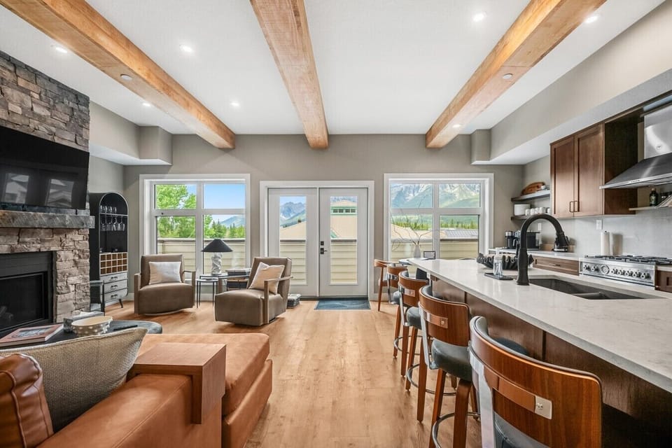 Open living, dining, and kitchen spaces keep everyone together.