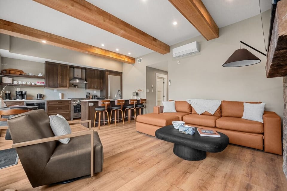 Stretch out in the open living area after a day in the mountains.