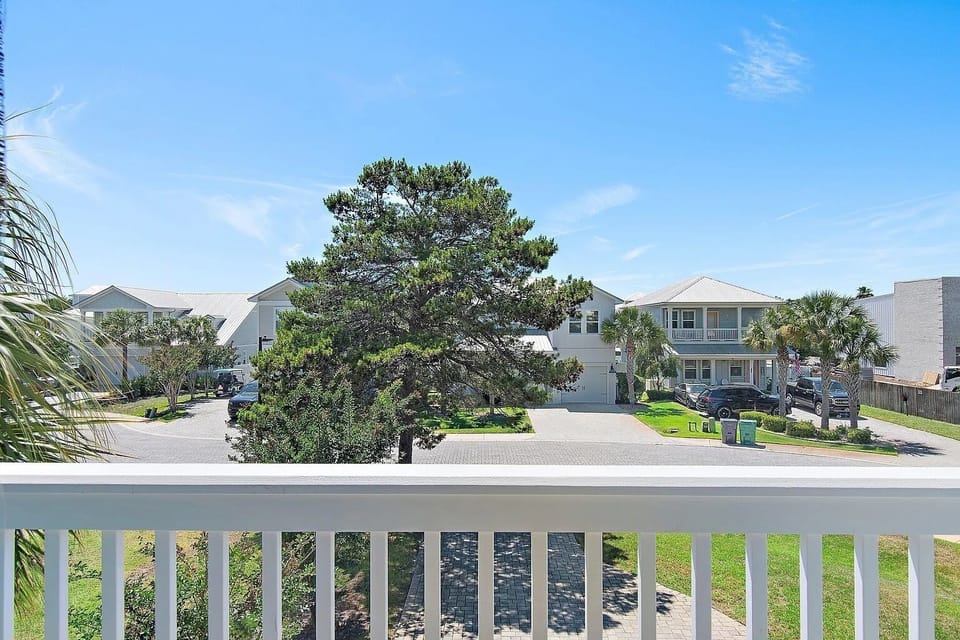 Relax on the balcony overlooking the quiet, beautifully maintained neighborhood.