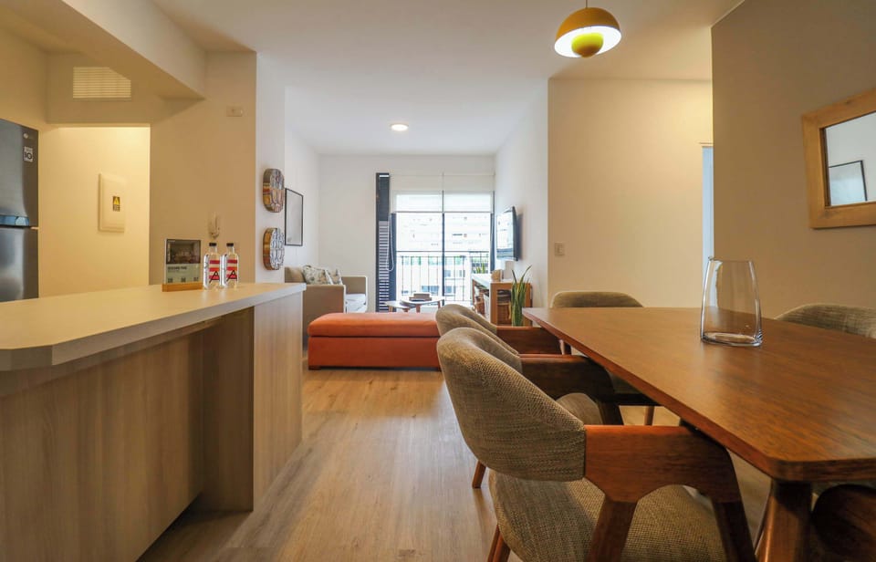 Seamless dining and kitchen layout with a modern touch.