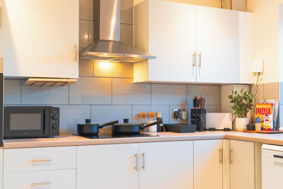 Bright modern kitchen with full appliances and plenty of prep space