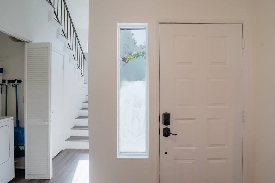 Staircase leading to bedrooms on the second floor