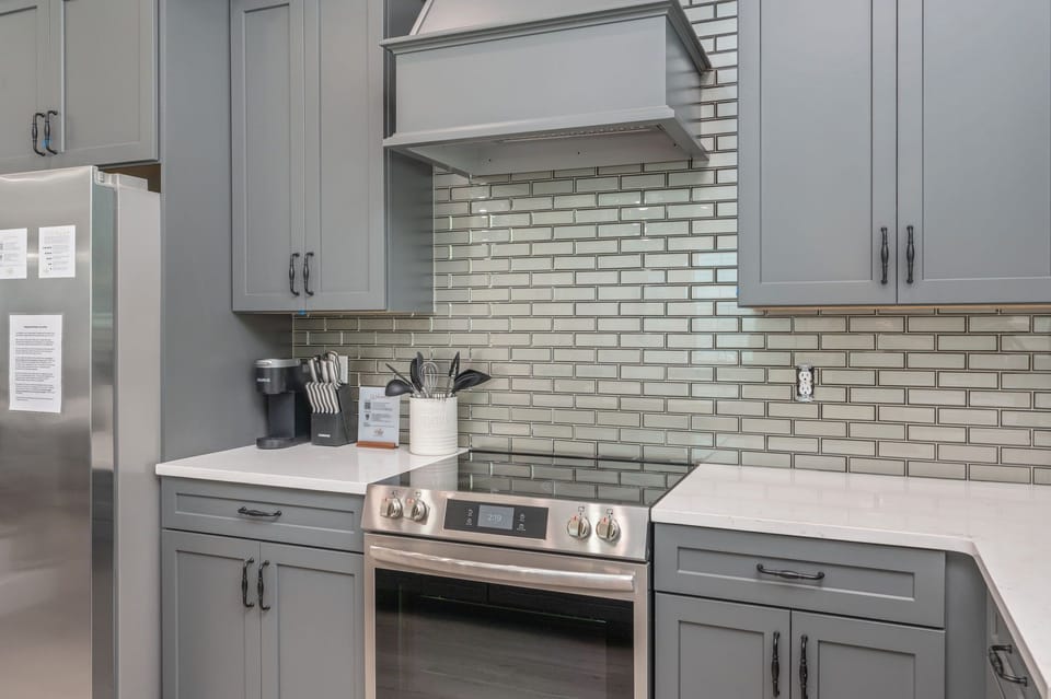 Stainless steel appliances in the kitchen allow the family cook to show off! 